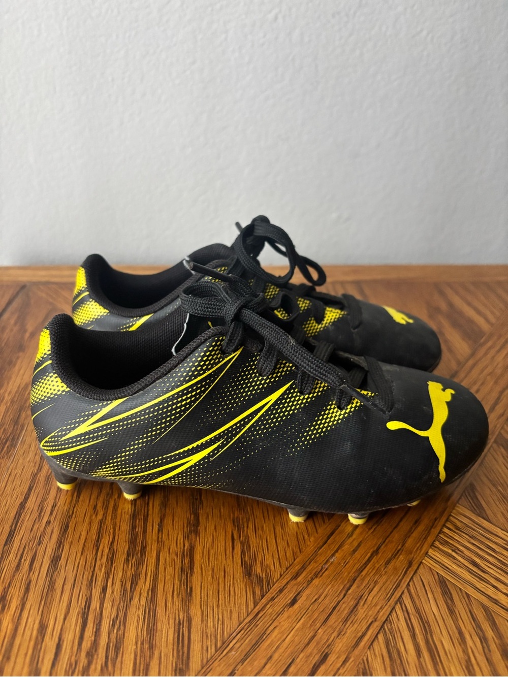 Puma Black & Yellow Soccer Cleats Kids size 12